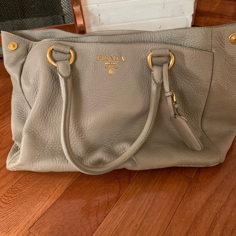 Authentic Prada Handbag in grey with gold metal